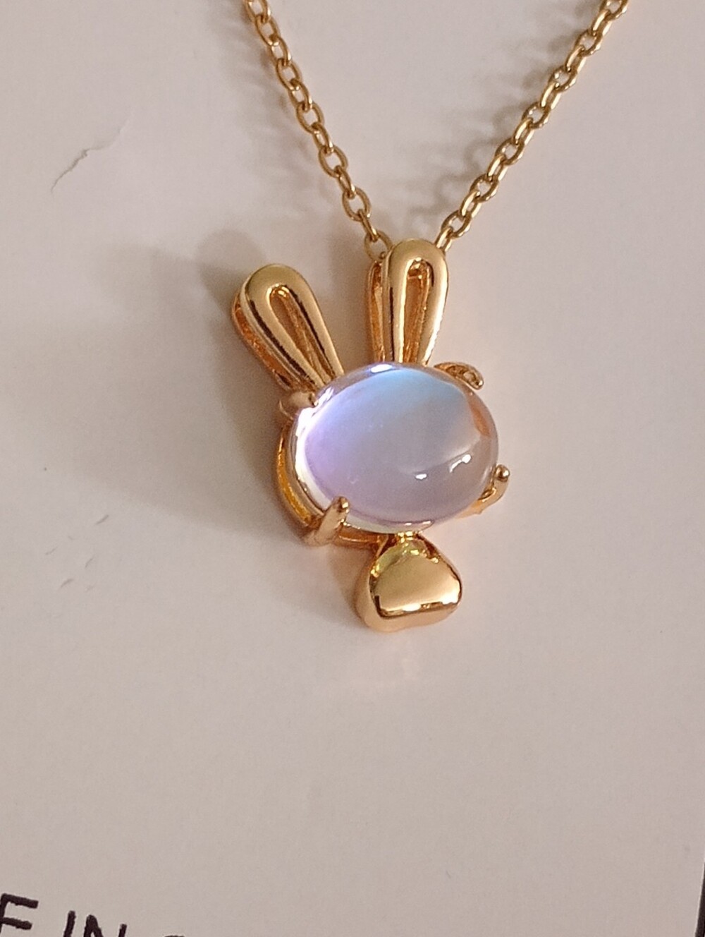 Fashion Jewelry Gold Bunny Necklace with Opalescent Blue Stone